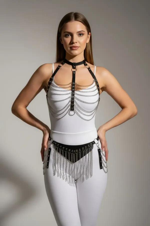black faux leather body harness with draped silver chain skirt and integrated collar, full-body view