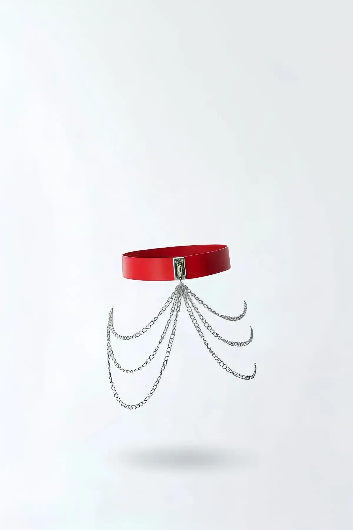 Red faux leather waist belt with five cascading silver draping body chains and rectangular front clasp