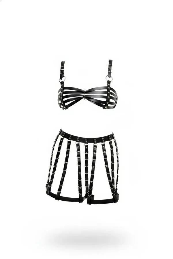 black faux leather strappy cage bra and harness skirt set with silver O-rings front view