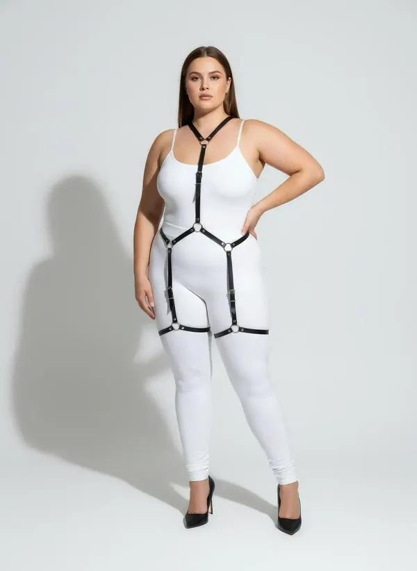 black faux leather full body garter harness with five silver O-rings and adjustable thigh straps worn over white bodysuit