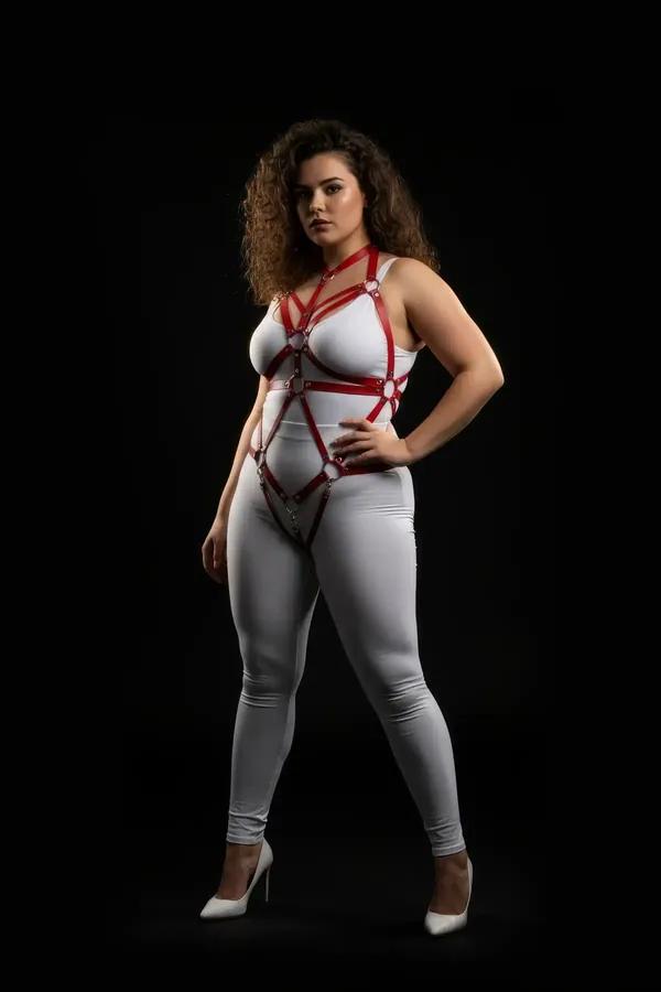 red faux leather strappy body harness with five silver O-ring accents geometric strap pattern chest to thigh plus size
