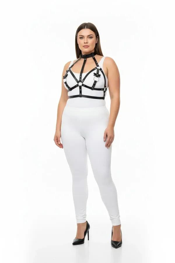 black faux leather strappy chest harness with choker neck collar and silver O-ring center worn over white top