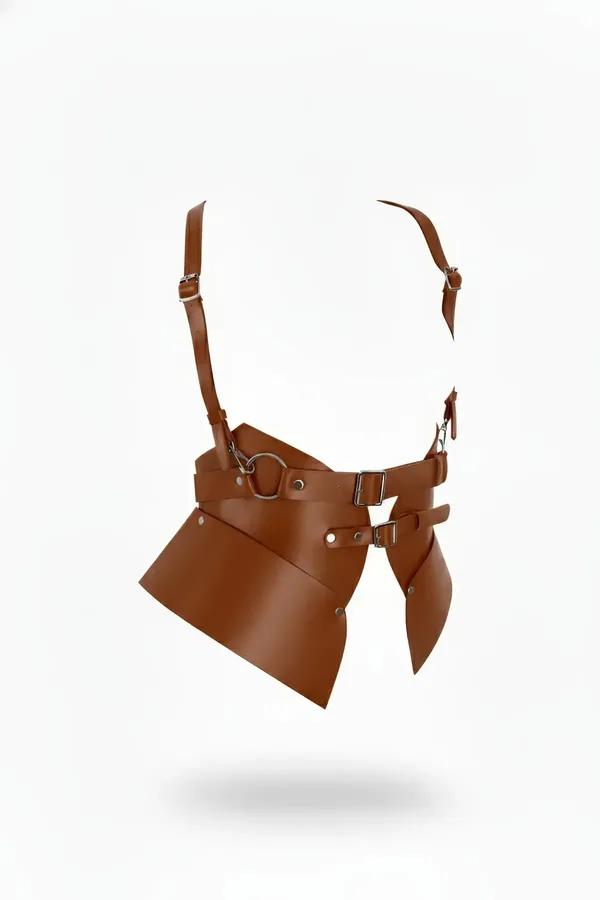 tan faux leather underbust corset harness with wide panels, silver O-ring buckles, and slim shoulder straps