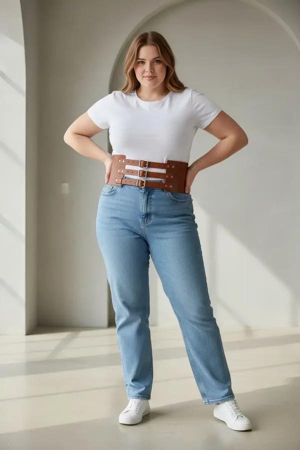 brown faux leather wide waist cinch harness belt with three silver-tone adjustable buckle straps worn over white tank top