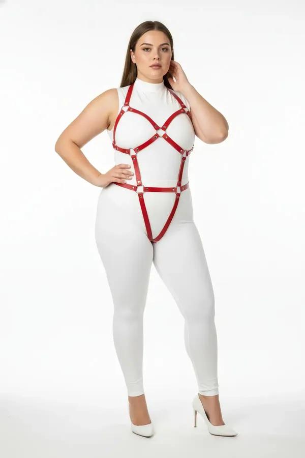 red vegan leather full body harness with gold O-ring detail and X-cross chest cage on plus-size model