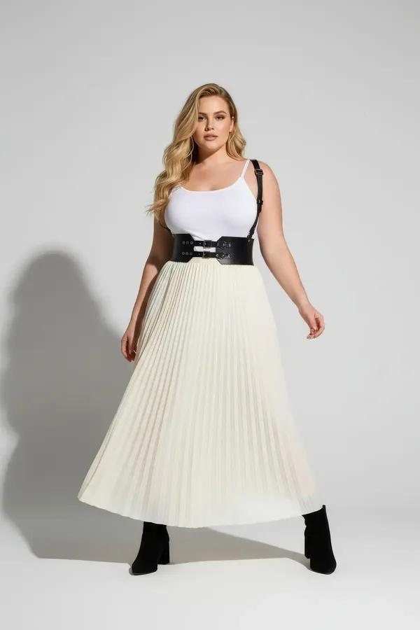 black wide faux leather waist harness with dual silver-tone buckle shoulder straps worn over white ribbed top and cream pleat