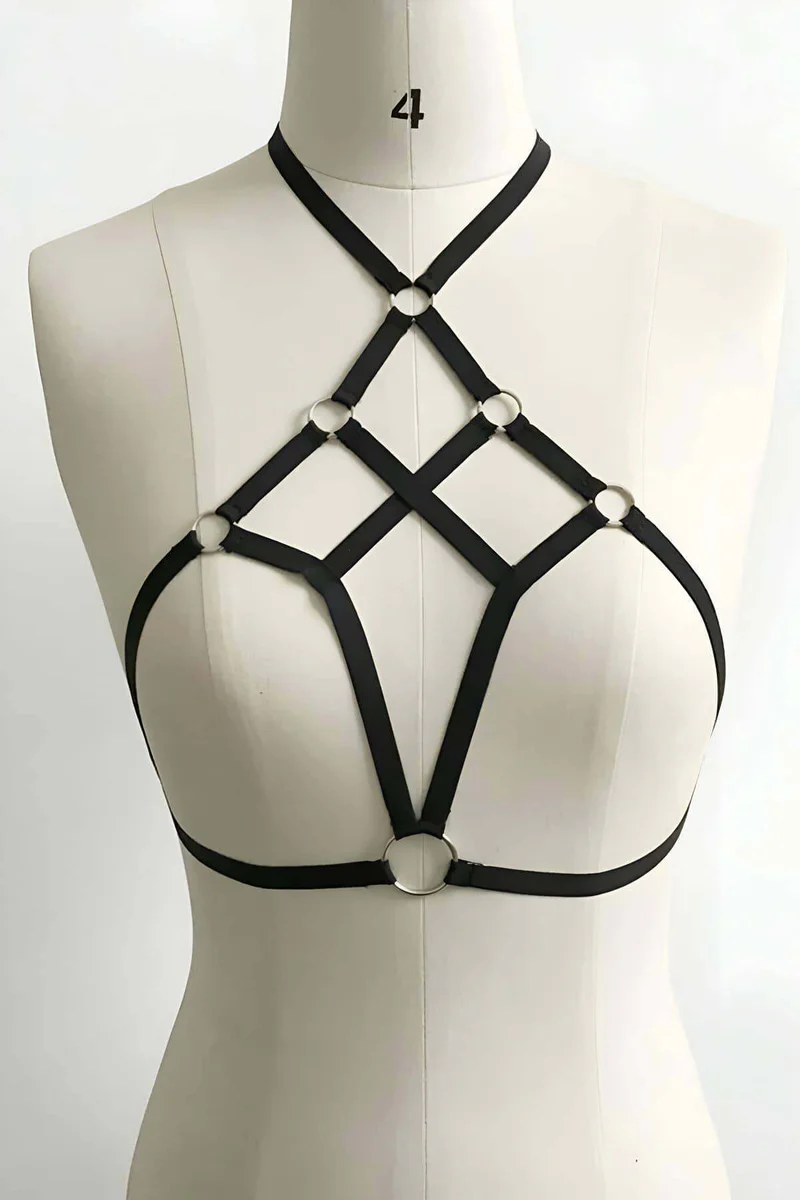 Black strappy chest harness with O-ring accent side view