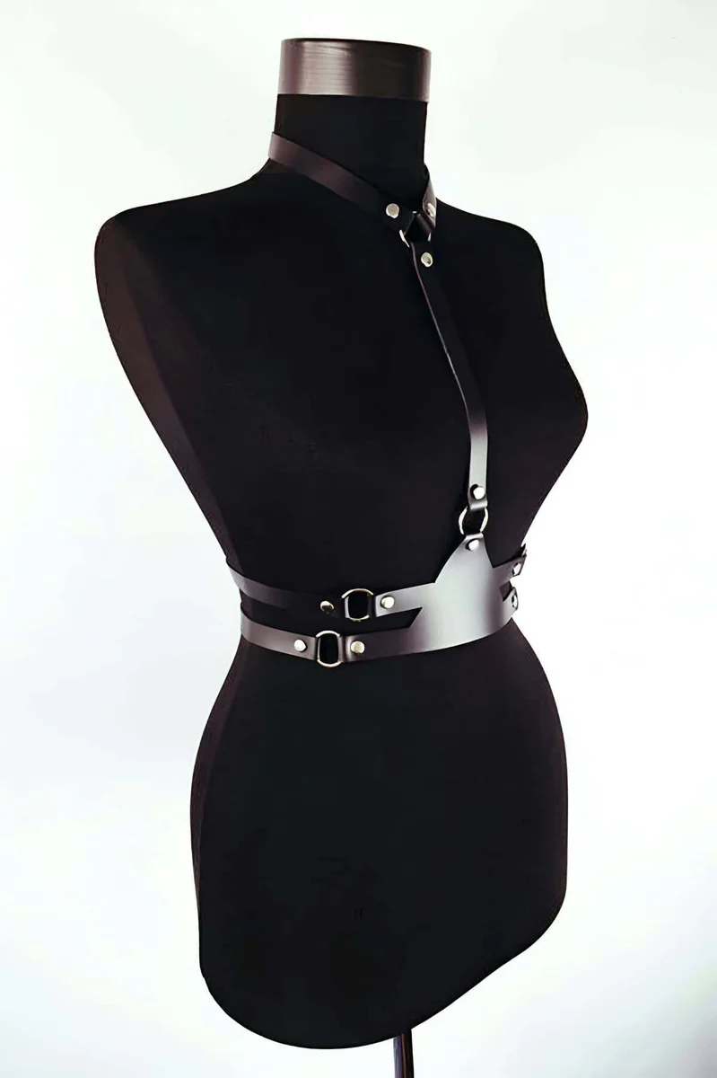 Black faux leather chest harness double belt showing O-ring hardware