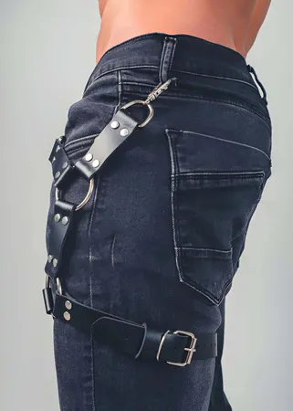 Black Faux Leather Thigh Harness with Silver O-Rings on Dark Jeans