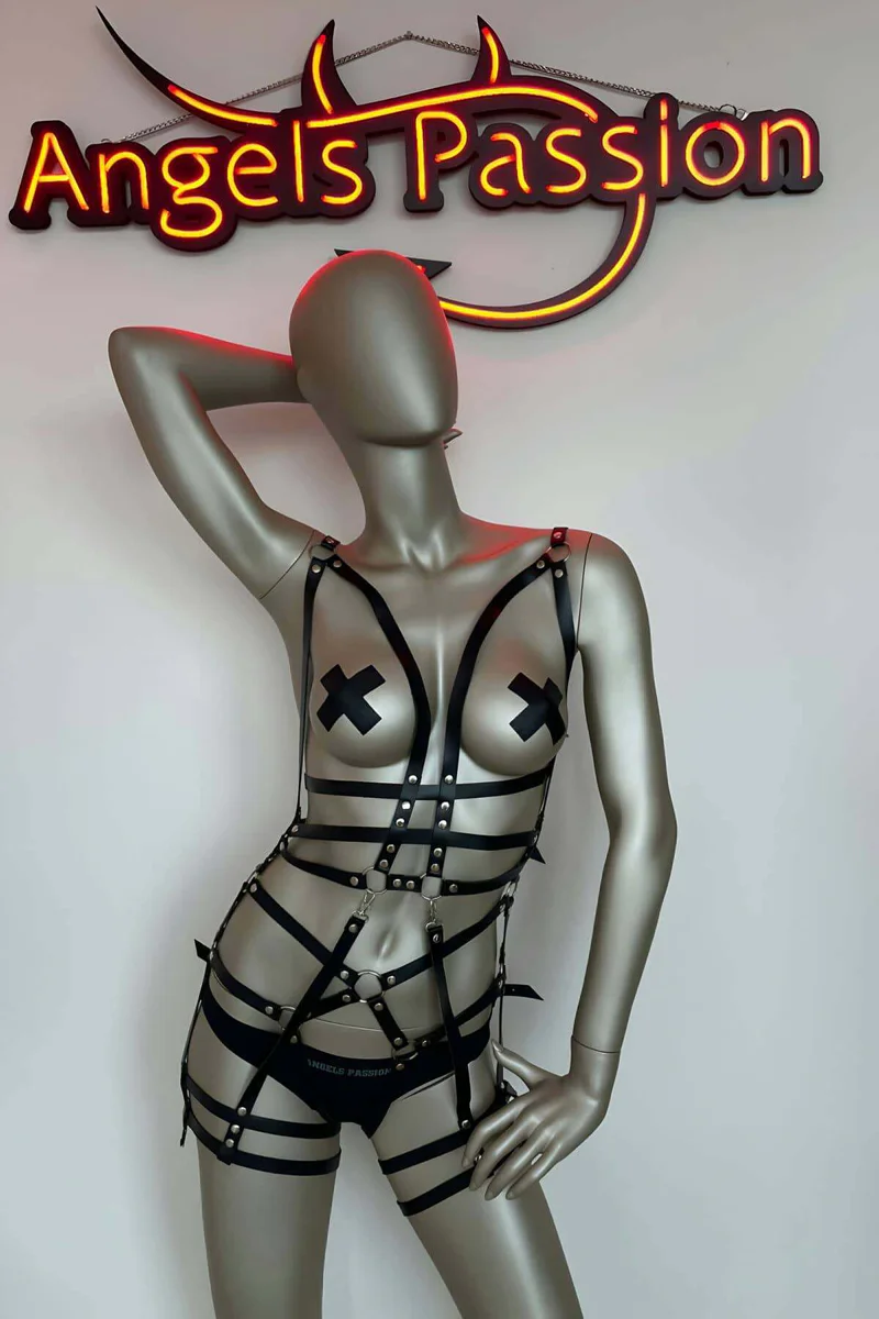 Black strappy full body harness O-ring detail back view showing strap configuration