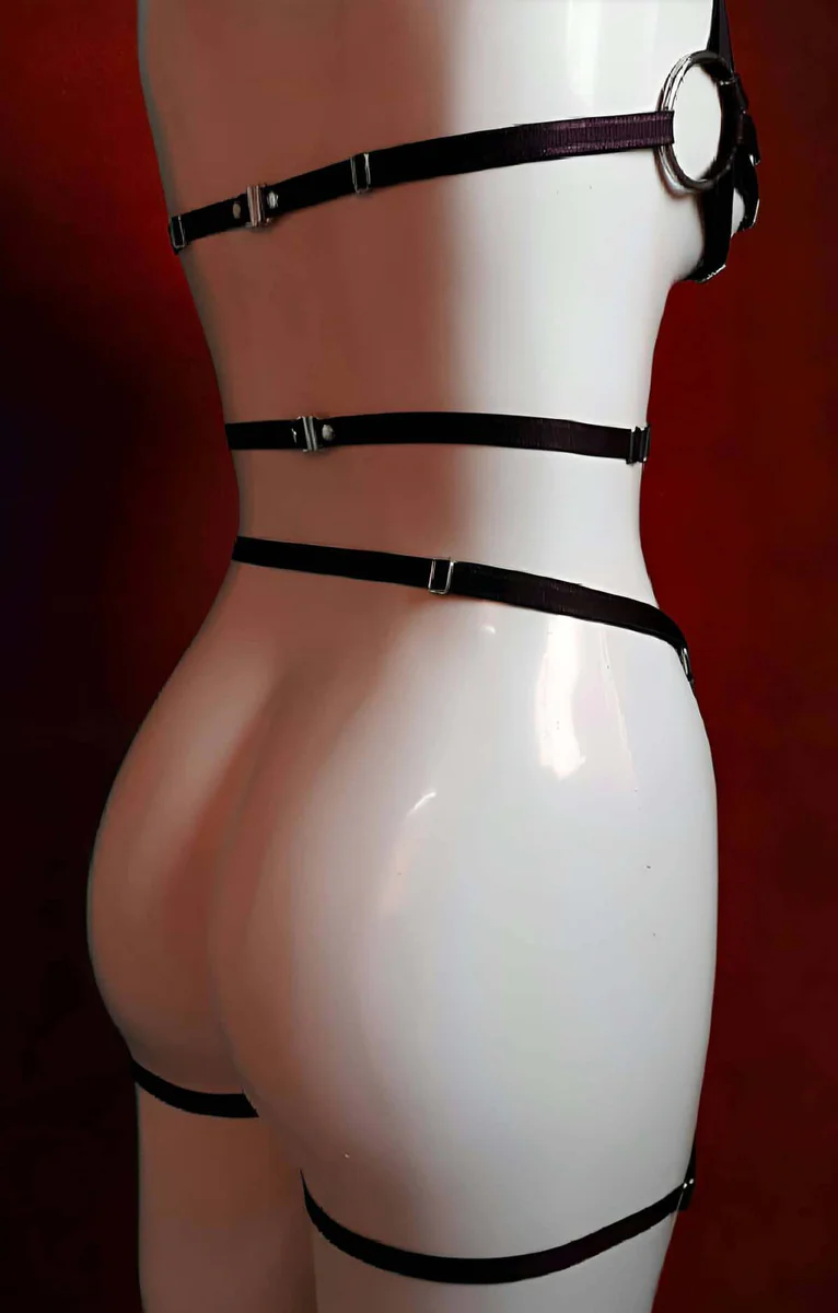 Black full body harness O-ring accents side profile showing straps and garter bands