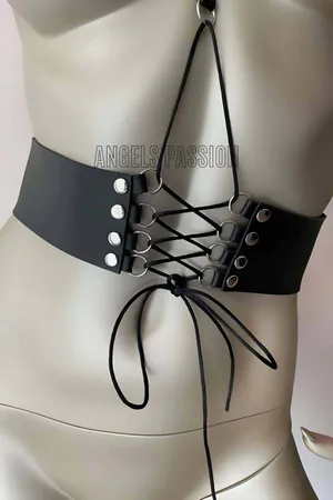 Black vegan leather lace-up corset body harness with adjustable chest strap