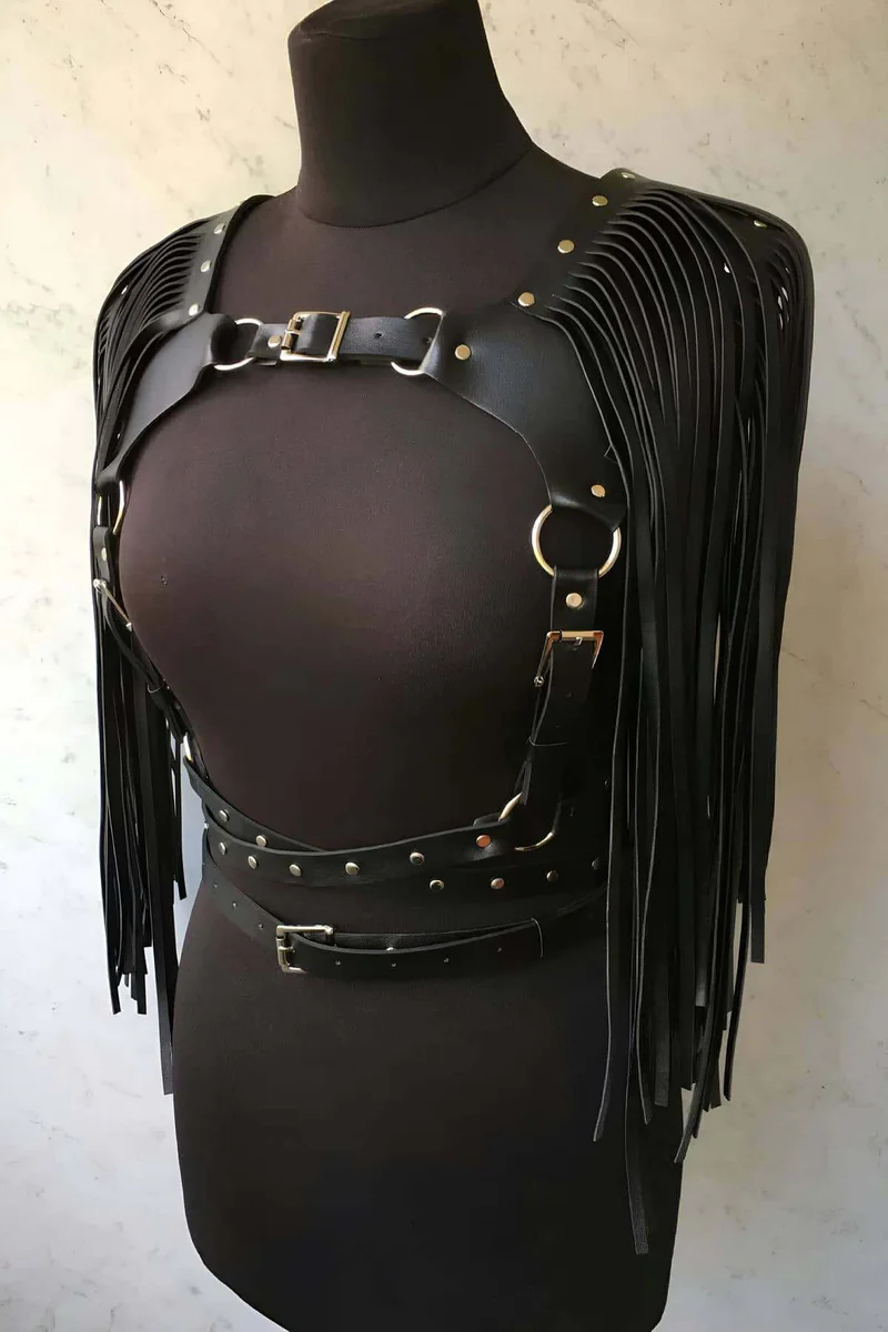 Black faux leather fringe body harness with studded belt and adjustable straps