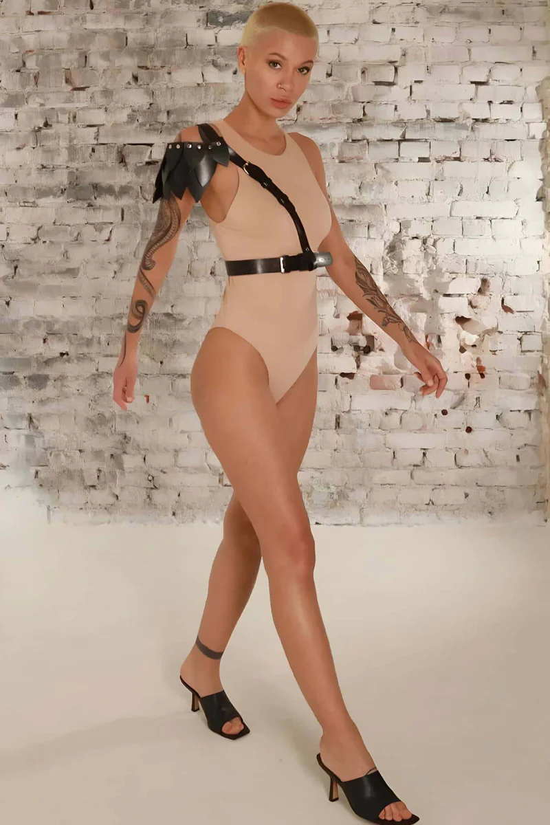 Black asymmetrical harness waist belt detail adjustable buckle