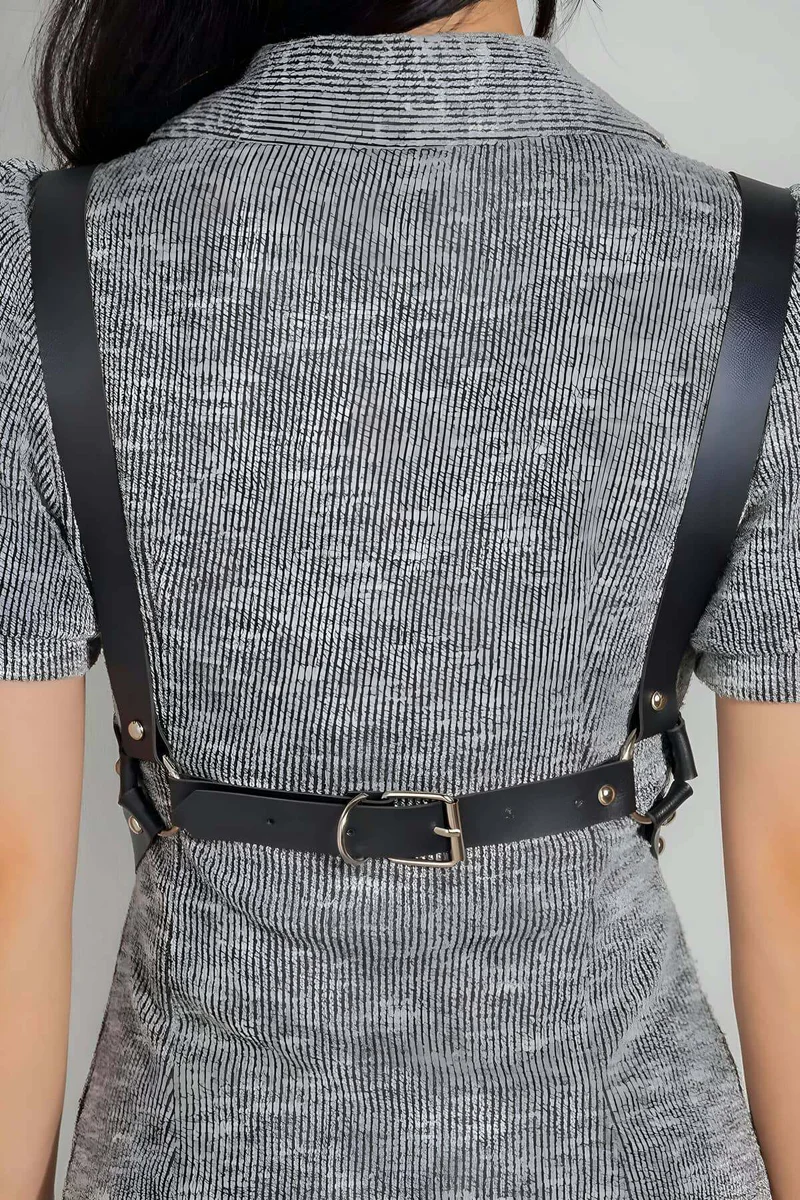 Black studded body harness back view showing adjustable straps