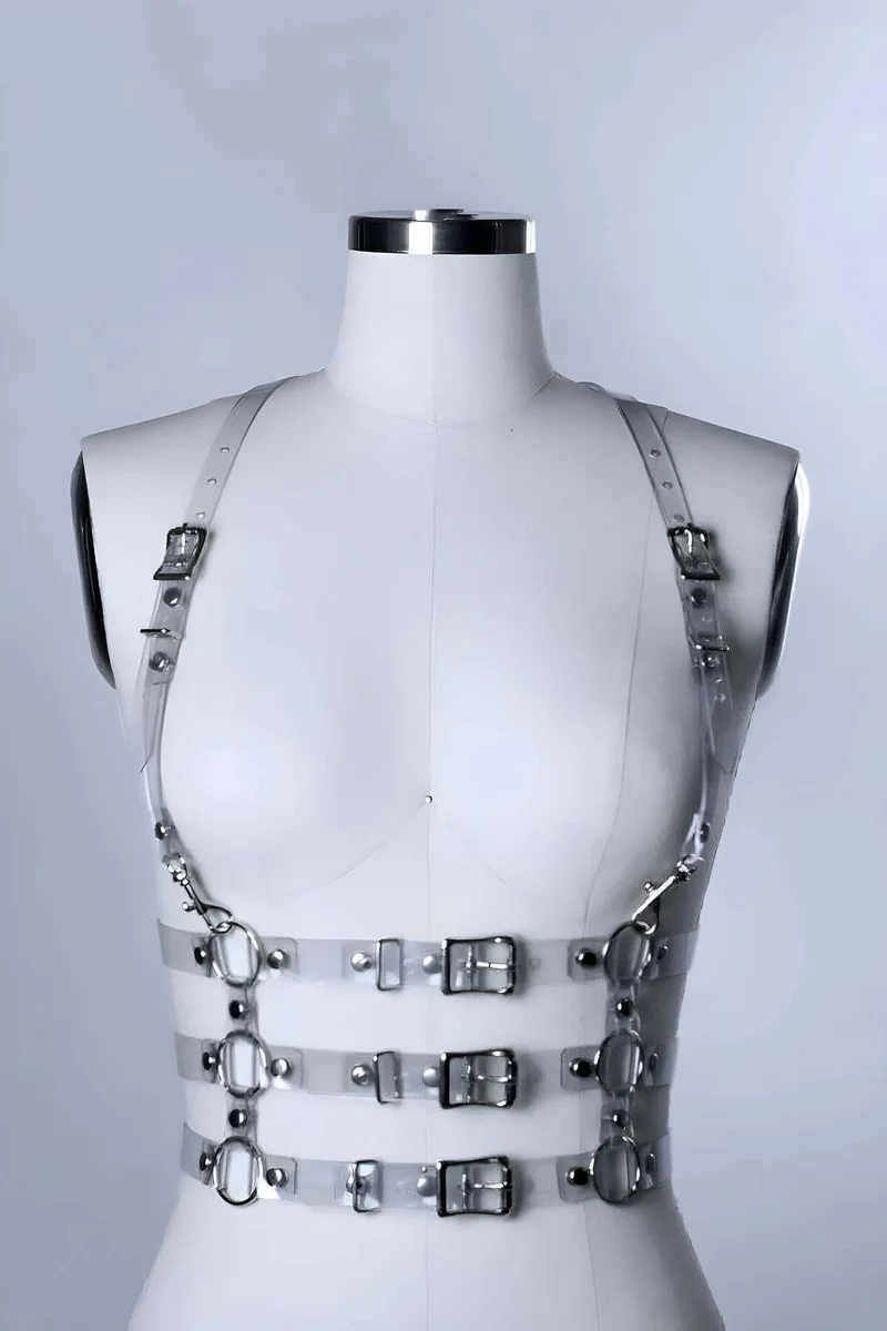 Transparent harness chest strap detail with silver buckle