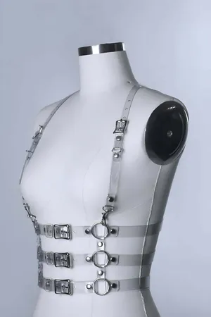 Transparent PVC body harness with silver O-ring details and adjustable buckles