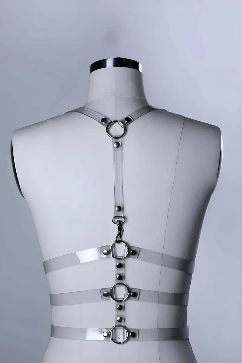 Transparent body harness with O-ring details over black top from side
