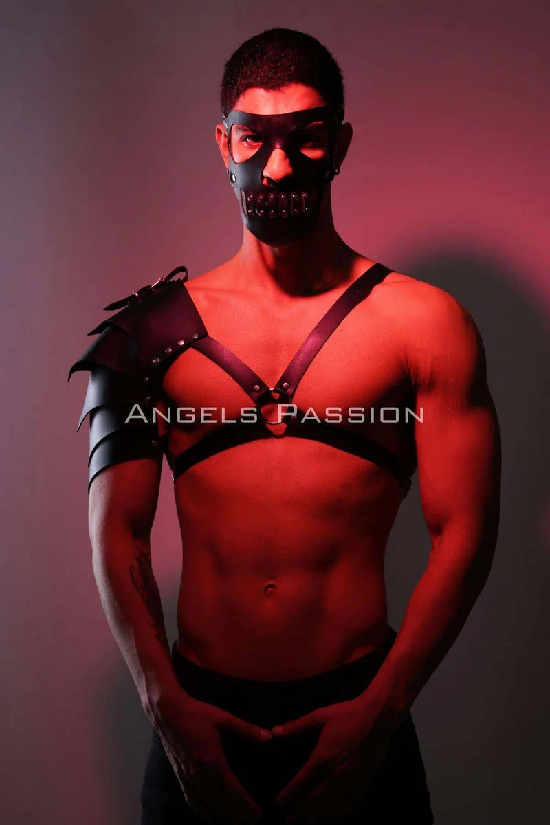 Black studded mask and single shoulder armor harness with adjustable straps
