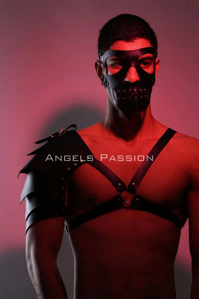 Black leather mask and shoulder armor harness with studded detail
