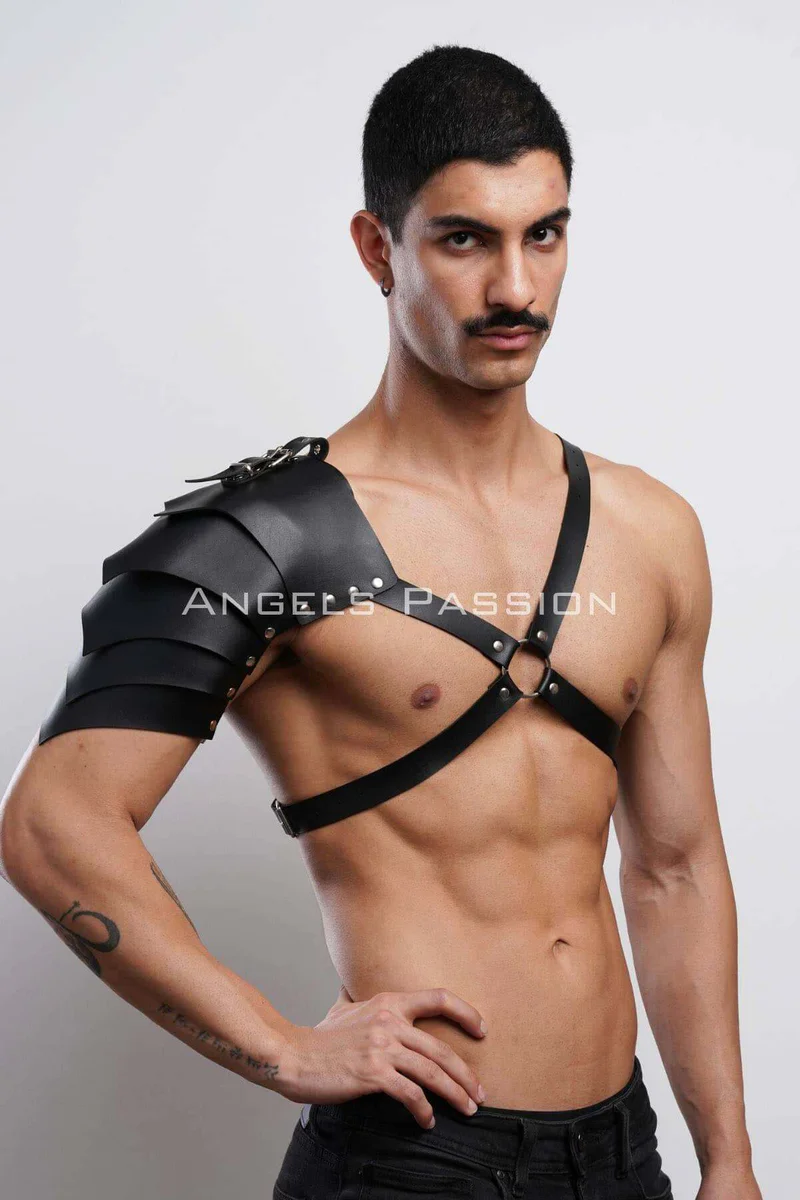 Black leather armor harness with chest straps and layered shoulder protection