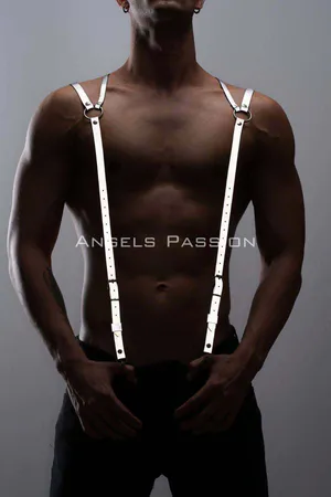 Silver reflective shoulder harness with O-ring detail worn by a person, adjustable straps