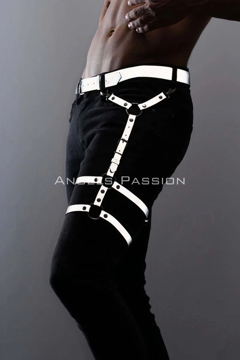 White festival leg harness with reflective straps and O-ring details