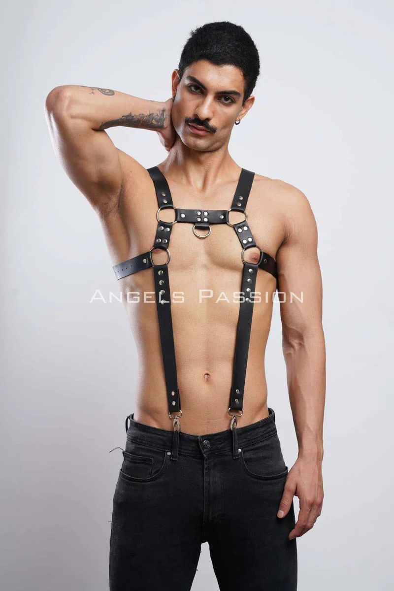 Black O-ring chest harness with suspender straps visible