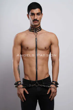Black Faux Leather Body Harness with Collar and Cuffs, featuring a multi-strap collar with a central O-ring, a vertical body