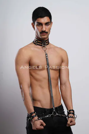 Black Faux Leather Body Harness with Collar and Cuffs, featuring a multi-strap collar with a central O-ring, a vertical body