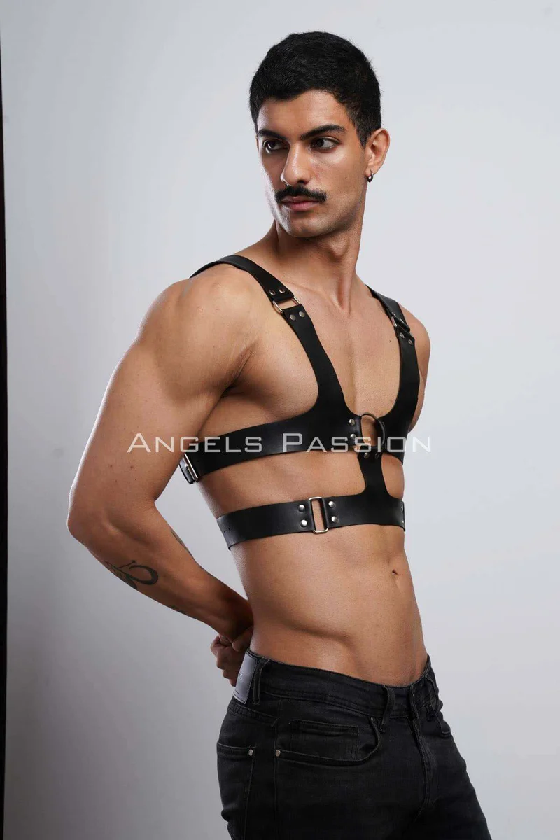 Side view of black faux leather chest harness showing strap configuration