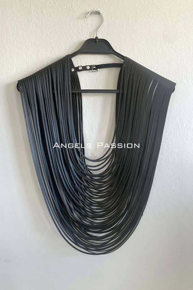 Layered fringe shoulder harness black draped effect detail