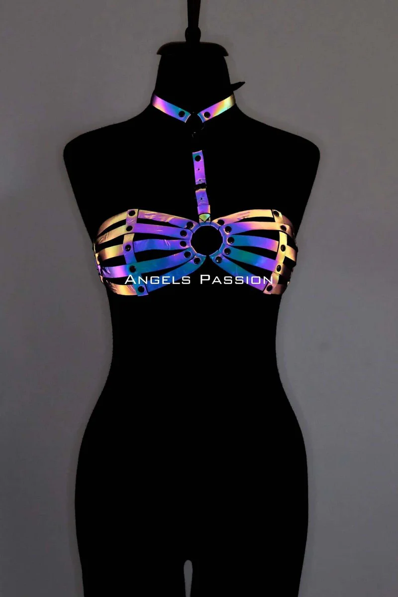 Close-up of reflective chest harness O-ring detail.