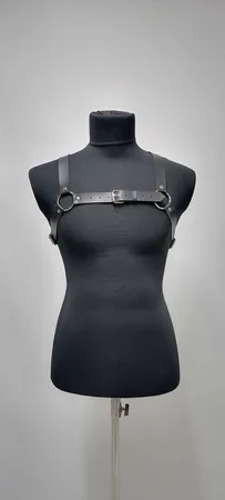 Black Faux Leather Chest Harness with O-Rings and Central Buckle on Mannequin