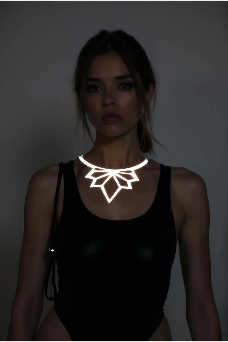 Geometric lotus reflective choker necklace worn by a model