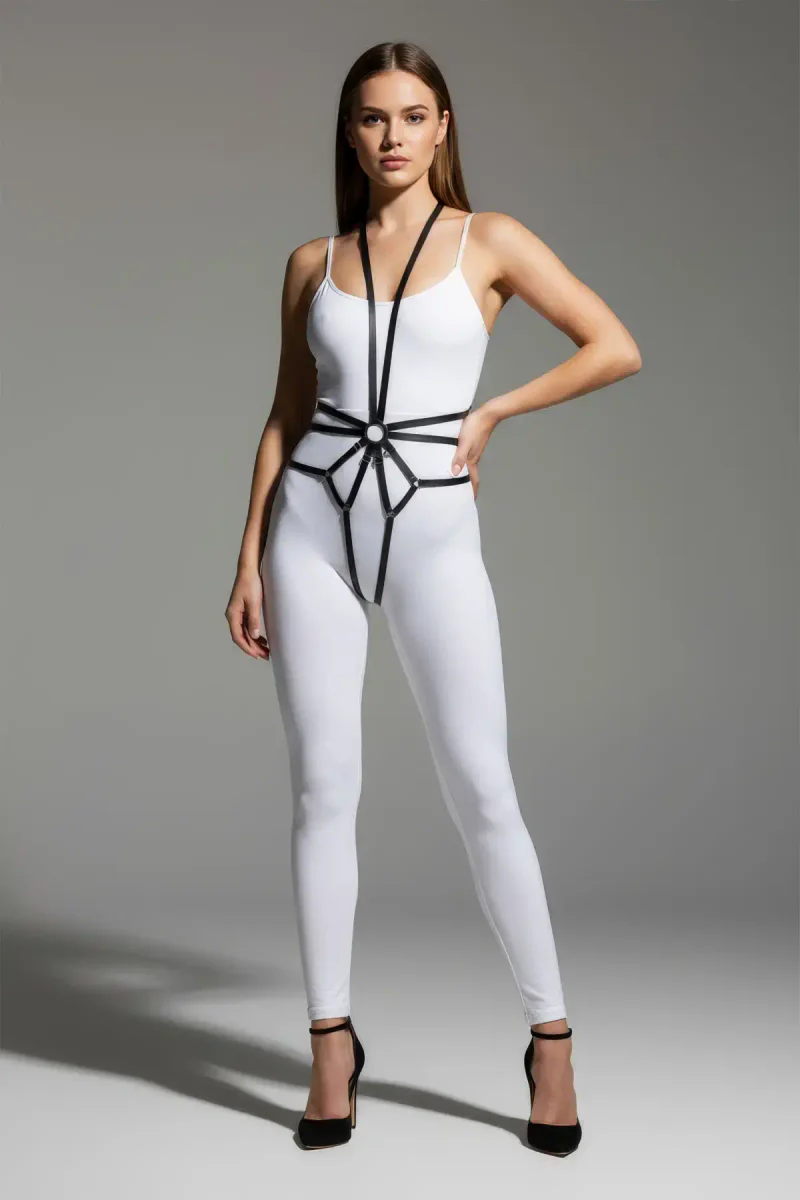 Black strappy full body harness with O-ring center worn by model