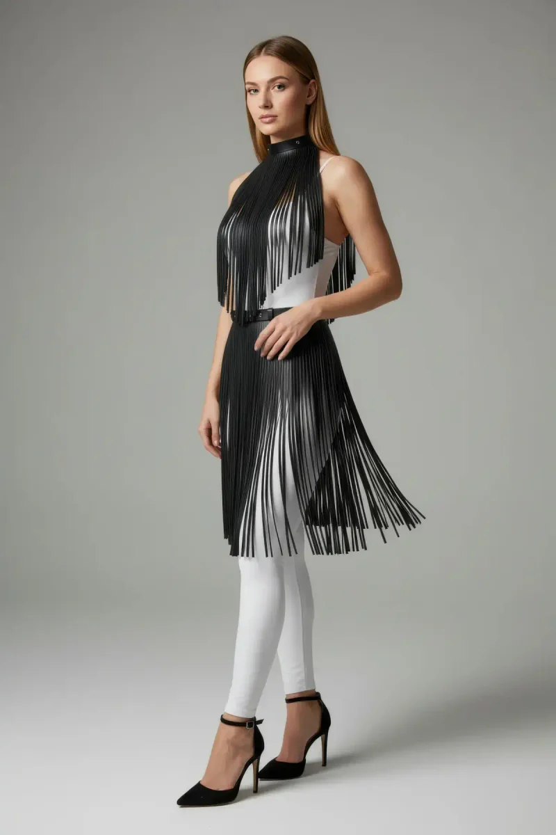 Black faux leather fringe mock neck overlay visible from front with halter straps