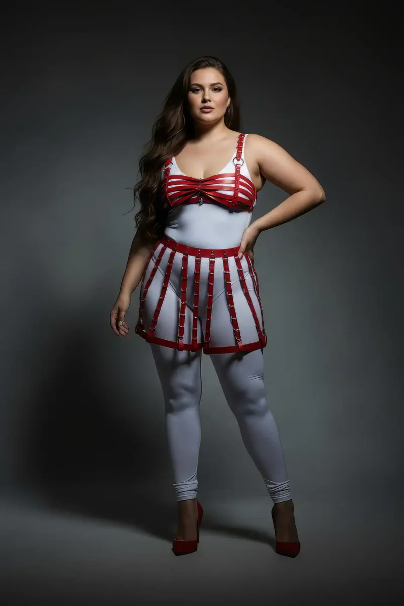 Model wearing red faux leather harness set side view