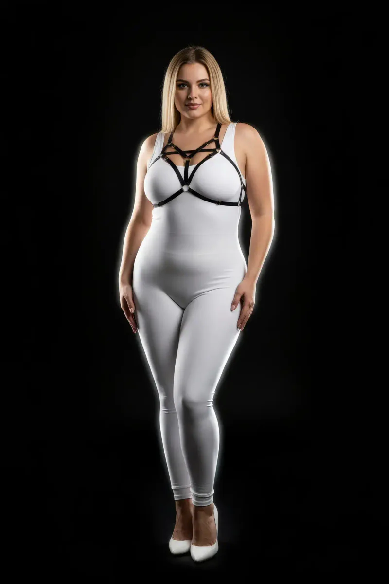 Black faux leather harness with O-ring detail on white bodysuit