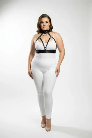 Black faux leather choker and chest harness set with O-ring detail on a plus size model