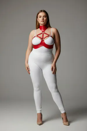 Red faux leather collar and chest harness set worn by a plus-size model.