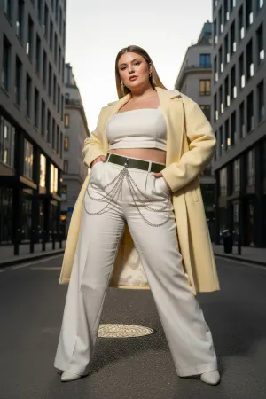 Dark Green Faux Leather Waist Belt with Draping Silver Chains worn on model over neutral trousers