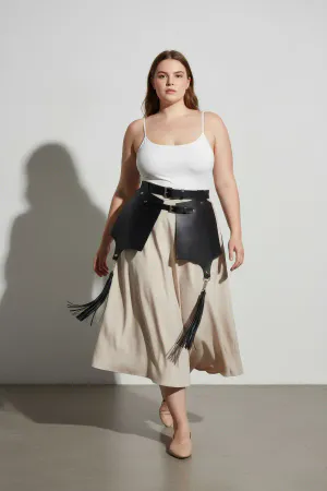Black Faux Leather Waist Harness with Wide Skirt Panels and Tassels on model