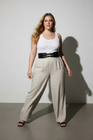 Black Faux Leather Double Buckle Waspie Waist Belt with Silver Studs on a model in a cafe