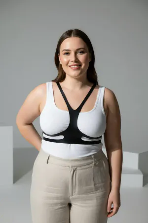 Black Faux Leather Minimalist Chest Harness Overlay for Women over white tank top