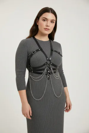Black Faux Leather Full Body Harness with Draping Silver Chains worn by plus size model over white tank top